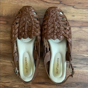 Brown leather covered toe sandals.